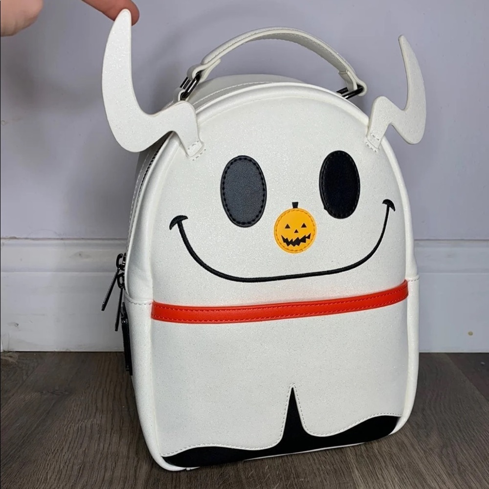 Loungefly The Nightmare Before Christmas Zero Glitter Light-Up Nose Backpack